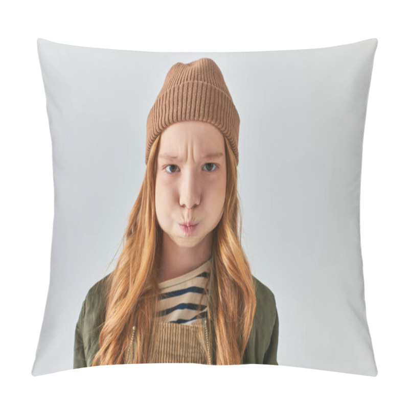 Personality  Displeased Preteen Girl In Stylish Winter Outfit With Knitted Hat Puffing Cheeks On Grey Background Pillow Covers