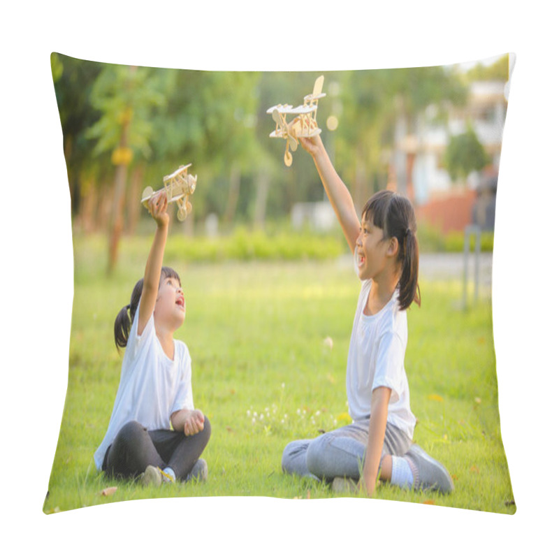 Personality  Two Cute Little Girl Asia Playing Toy Airplane On Nature In The Park. Little Dreams Of Flying Limitless Imagination .Which Increases The Development And Enhances Learning Skills. Pillow Covers