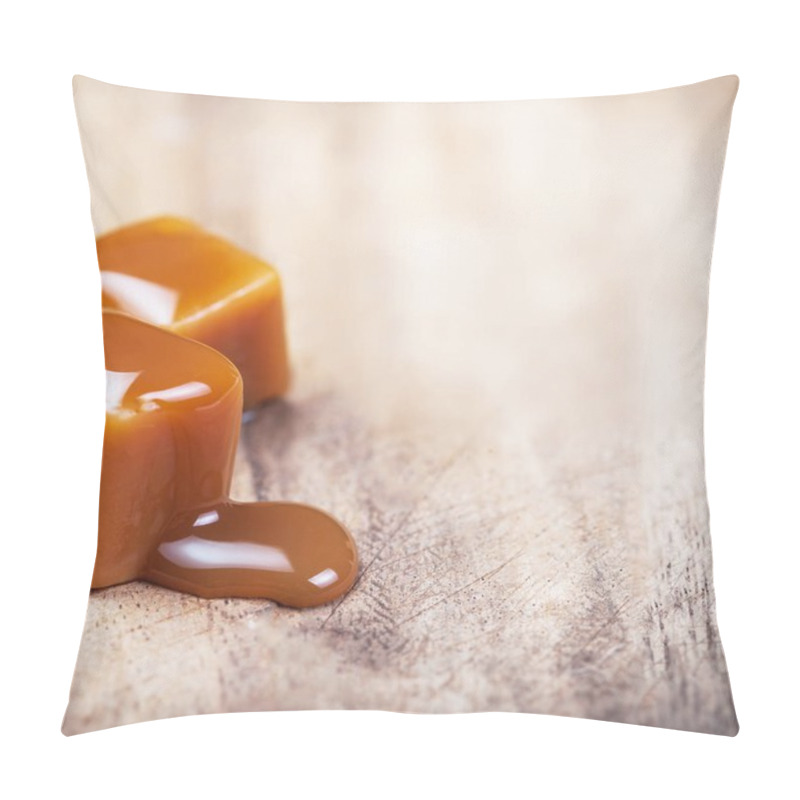 Personality  Homemade Caramel Sauce Flowing On Caramel Candies On Wooden  Background. Pillow Covers