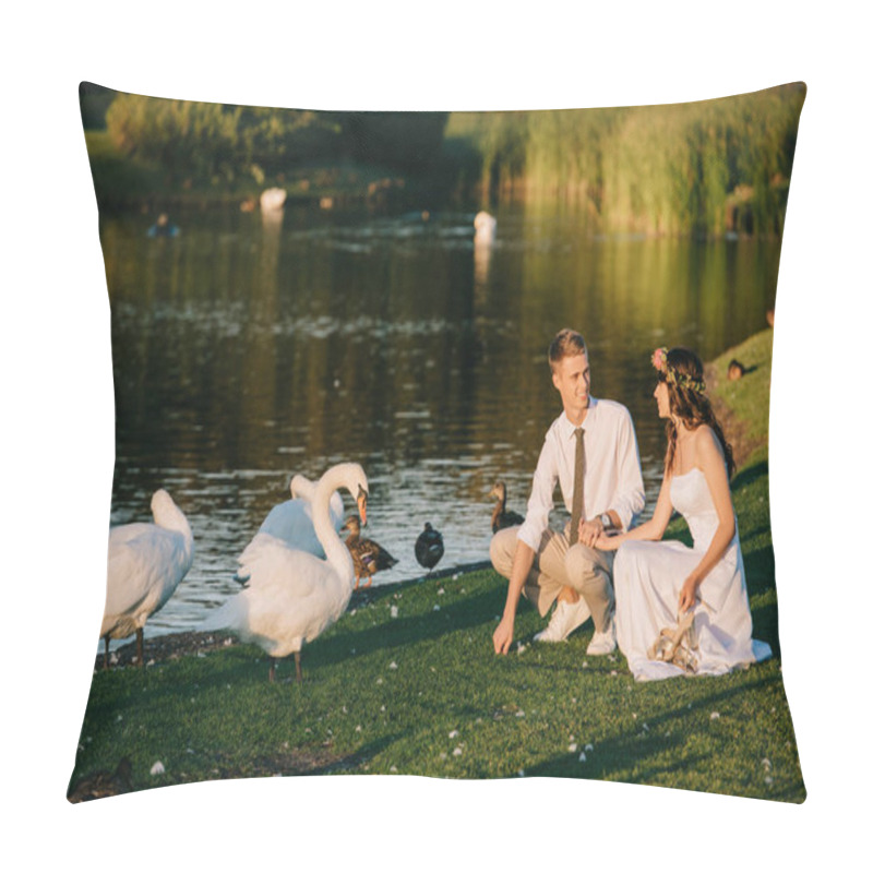 Personality  Happy Young Wedding Couple Feeding Swans And Smiling Each Other In Park  Pillow Covers