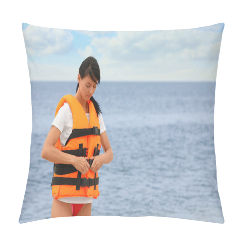 Personality  Beautiful Female Lifeguard Putting On Life Vest Near Sea Pillow Covers