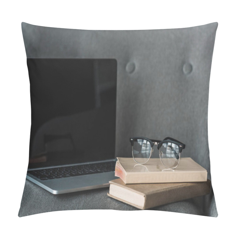 Personality  Laptop With Empty Screen And Books Lying On Grey Chair Pillow Covers