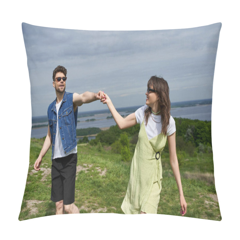 Personality  Smiling Brunette Man In Sunglasses And Denim Vest Holding Hand Of Stylish Girlfriend In Sundress And Spending Time On Grassy Hill With Cloudy Sky At Background, Countryside Wanderlust And Love Concept Pillow Covers