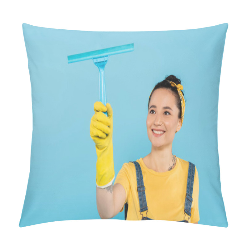 Personality  Pleased Woman In Yellow Rubber Glove Holding Window Cleaner Isolated On Blue Pillow Covers