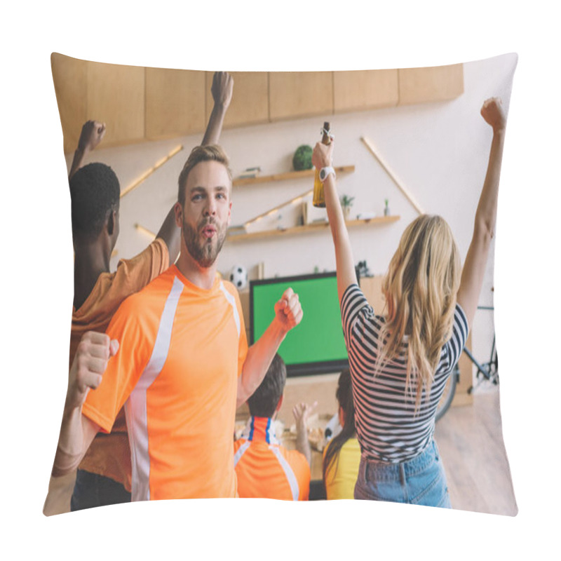 Personality  Excited Young Man Doing Yes Gestures And Looking At Camera While His Friends Celebrating And Watching Soccer Match On Tv Screen At Home Pillow Covers