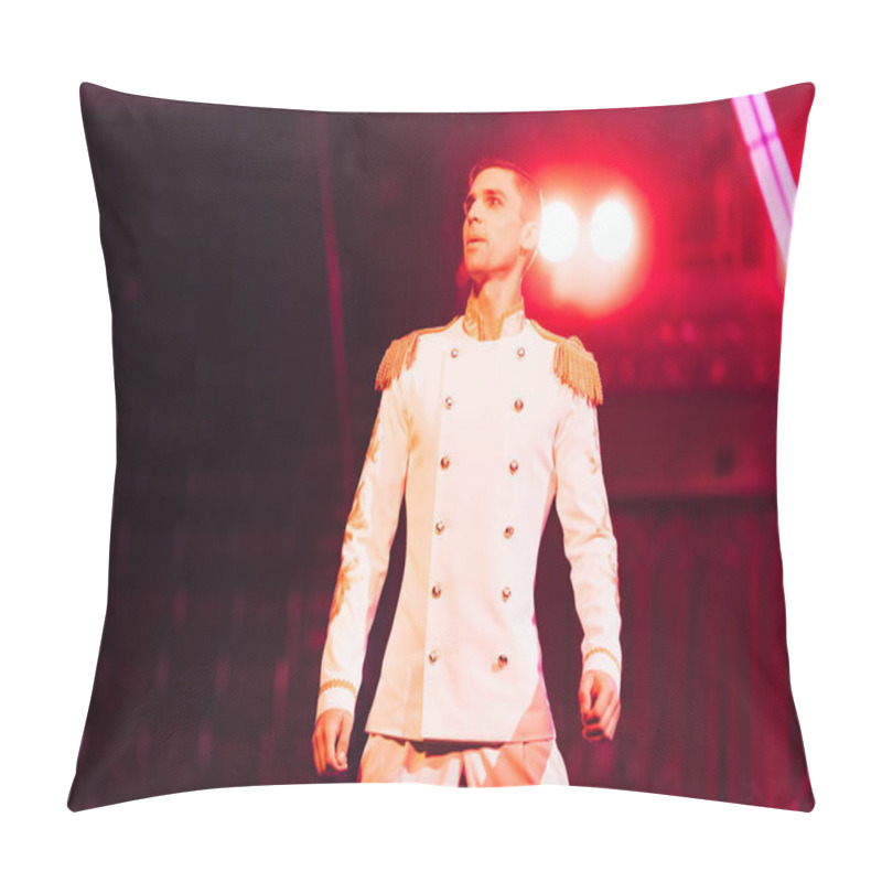 Personality  KYIV, UKRAINE - NOVEMBER 1, 2019: Low Angle View Of Handsome Performer Looking Away On Circus Arena Pillow Covers