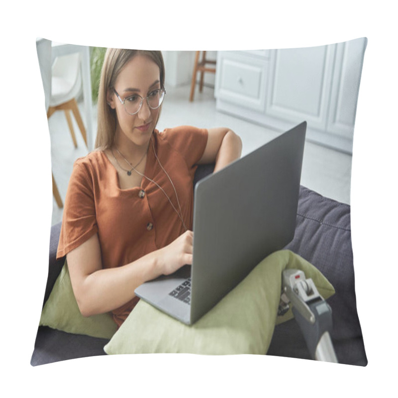 Personality  A Woman Sits On A Couch, Using A Laptop With A Prosthetic Leg Resting On The Cushion Beside Her. Pillow Covers