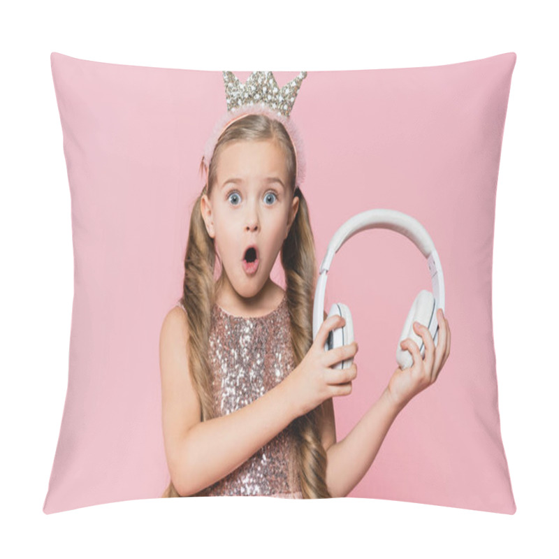 Personality  Shocked Little Girl In Crown Holding Wireless Headphones Isolated On Pink Pillow Covers