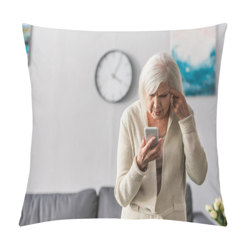 Personality  Thoughtful Senior Woman Touching Head While Using Smartphone Pillow Covers