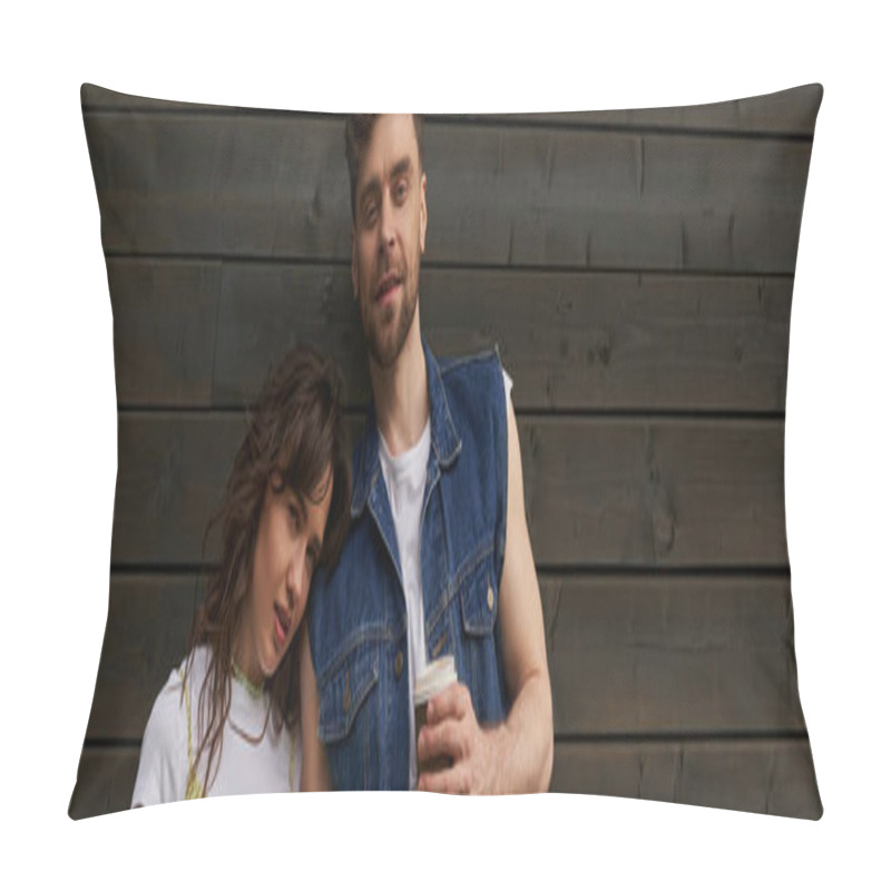 Personality  Smiling Bearded And Stylish Man In Denim Vest Holding Coffee To Go And Looking At Camera Near Stylish Girlfriend And Wooden House In Rural Setting, Carefree Moments Concept, Banner  Pillow Covers