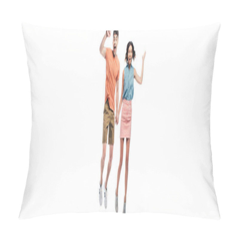 Personality  Panoramic Shot Of Happy Man And Woman Holding Hands And Jumping While Showing Triumph Gestures Isolated On White Pillow Covers