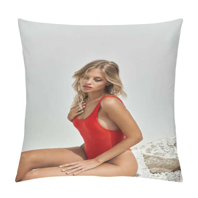 Personality  A Young Woman In A Vibrant Red Swimsuit Sits On A White Rock, Bathed In Sunlight. Pillow Covers