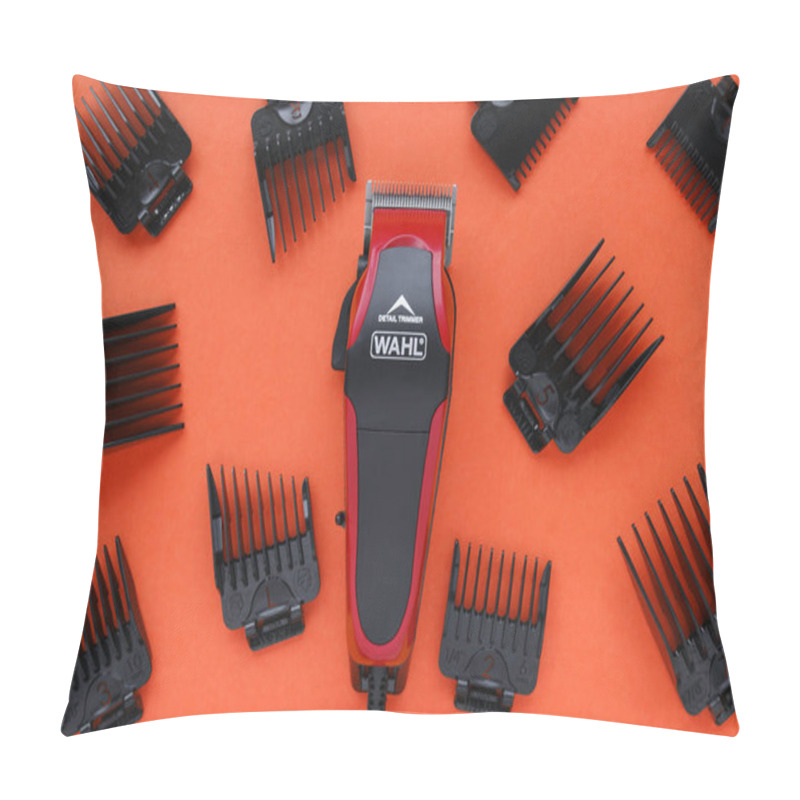 Personality  KHARKOV, UKRAINE - JULY 2, 2020 : Hairdressers Tool. Hair Clipper WAHL Close-up On A Red Background With Nozzles Of Different Sizes. Pillow Covers