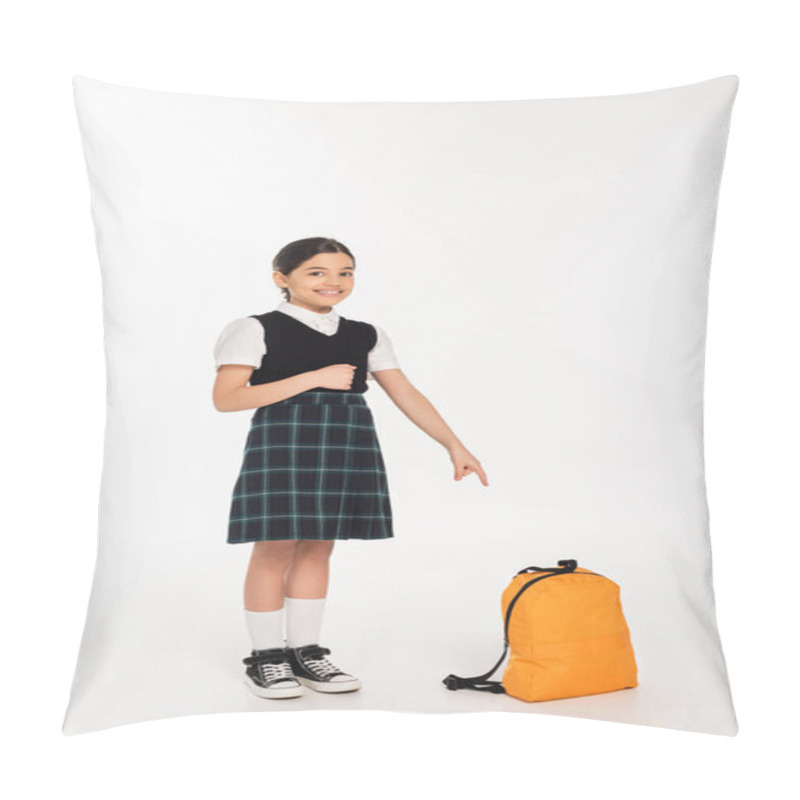 Personality  Cheerful Girl In School Uniform Standing And Pointing At Backpack On White Background, Full Length Pillow Covers