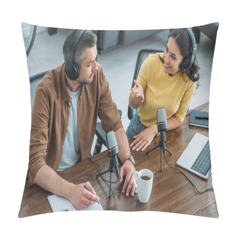 Personality  Cheerful Radio Host Talking To Colleague While Sitting At Wooden Table Near Microphones In Radio Studio Pillow Covers