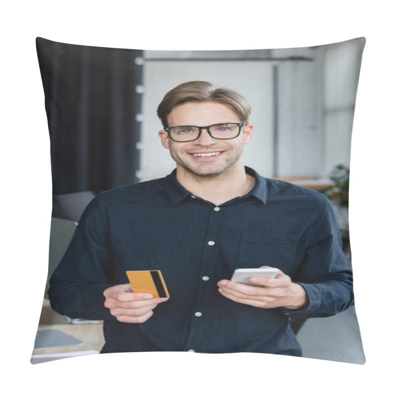 Personality  Smiling Developer Holding Credit Card And Cellphone While Looking At Camera In Office  Pillow Covers