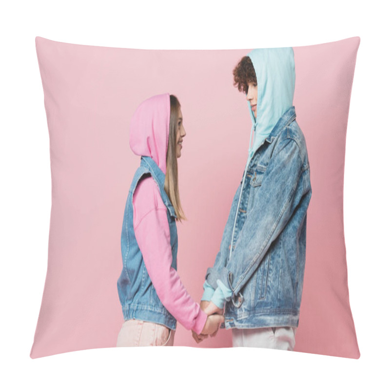 Personality  Side View Of Smiling Teenagers In Hoodies Holding Hands Isolated On Pink  Pillow Covers