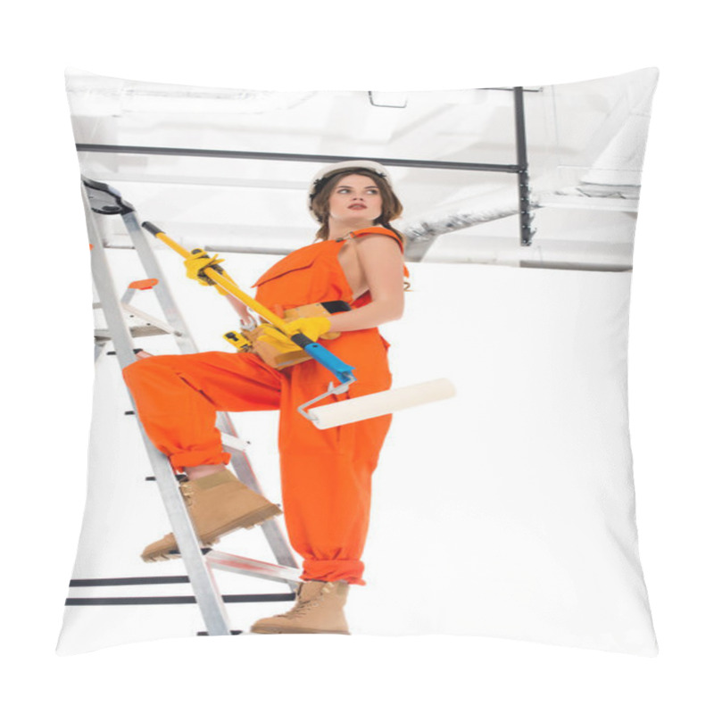 Personality  Brunette Workwoman In Overalls And Hardhat Holding Painting Roller While Standing On Ladder Pillow Covers