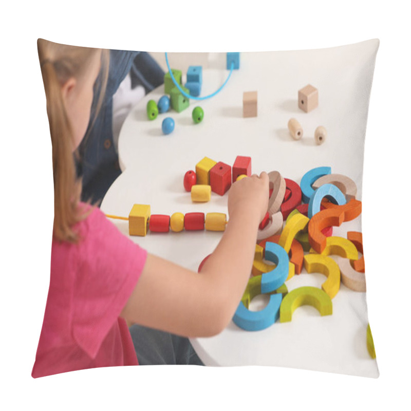 Personality  Little Children Playing With Wooden Pieces And String For Threading Activity At White Table Indoors, Closeup. Developmental Toys Pillow Covers