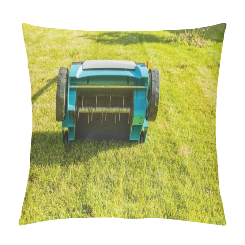 Personality  Close Up View Of Electric Lawn Aerator On Green Grass Isolated. Garden Machines Concept.  Pillow Covers