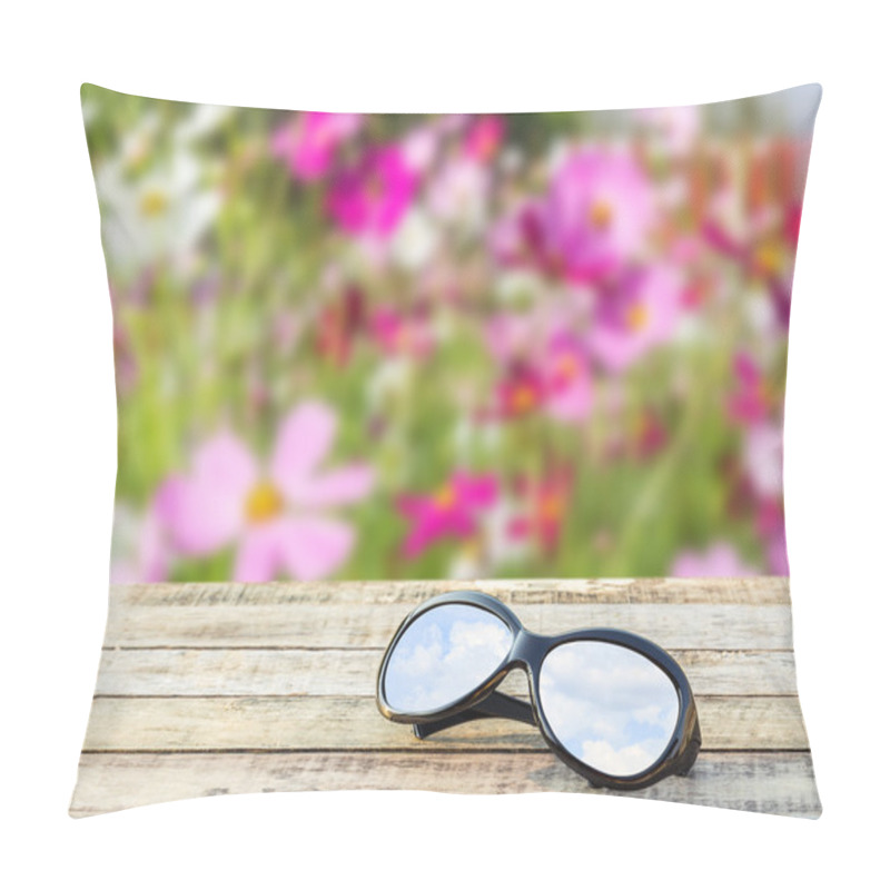 Personality  Clear Sky In Eyeglasses On The Wooden Table Over Blurred Backgro Pillow Covers