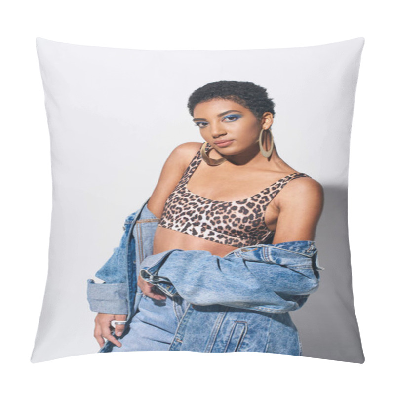 Personality  Stylish African American Woman With Bold Makeup And Short Hair Posing In Top With Animal Print And Casual Denim Attire While Standing On Grey Background, Denim Fashion Concept Pillow Covers