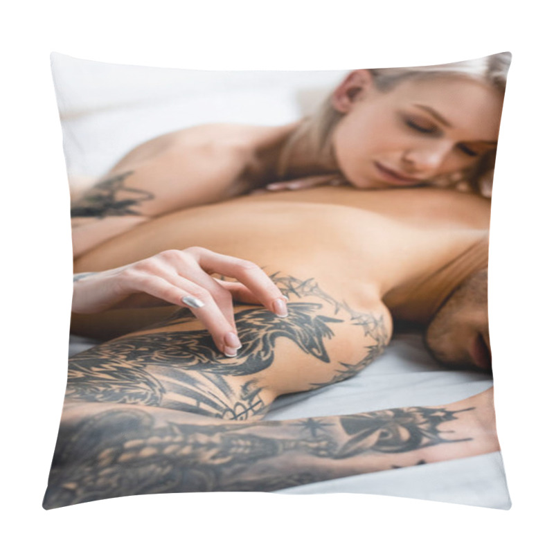 Personality  Selective Focus Of Naked Girl Touching Shirtless Tattooed Boyfriend On Bed Isolated On White Pillow Covers