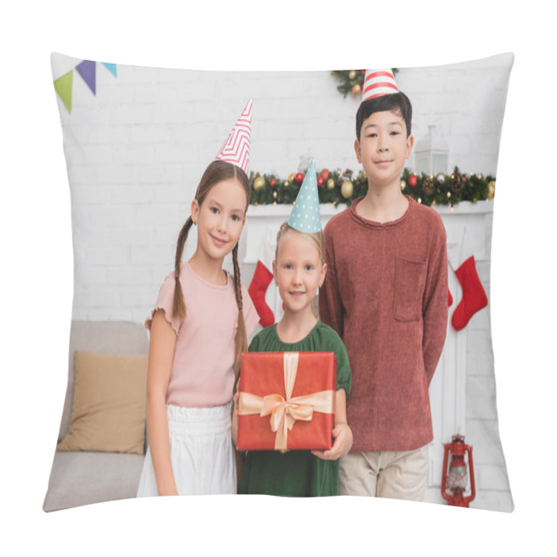 Personality  Multiethnic Kids In Party Caps Standing Near Friend With Gift Box And Christmas Decoration At Home  Pillow Covers