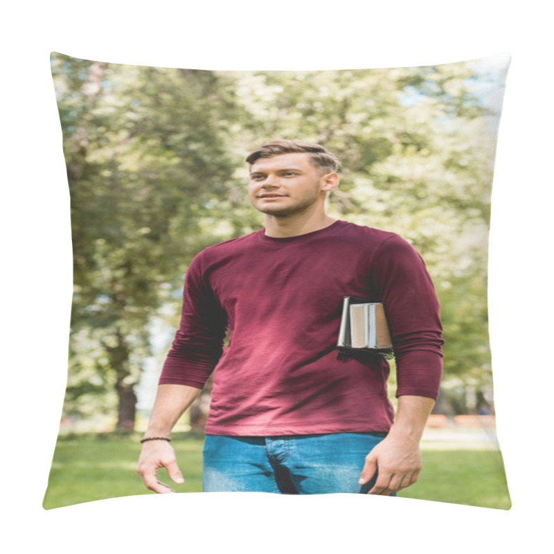 Personality  Handsome Student Standing With Books And Smiling In Park Pillow Covers