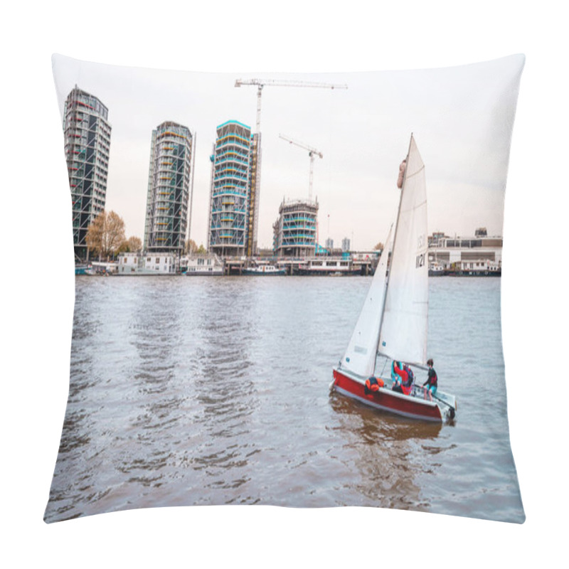 Personality  London, UK - April 17 2014: A Sailboat On The River Thames. Nine Elms Is In The Background With Residential Developments Along The Riverside.  Pillow Covers