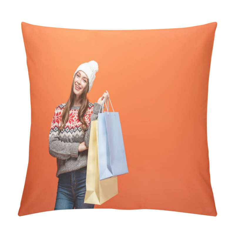 Personality  Happy Girl In Winter Outfit Holding Shopping Bags On Orange Background Pillow Covers