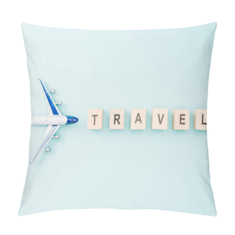 Personality  Top View Of Toy Plane And Wooden Cubes With Travel Lettering On Blue Background Pillow Covers