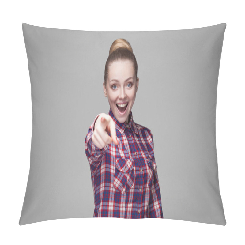 Personality  Amazed Beautiful Blonde Woman In Pink Checkered Shirt With Collected Bun Hairstyle Looking At Camera And Pointing With Finger On Gray Background Pillow Covers