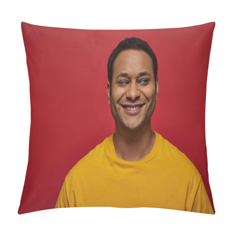 Personality  Sly Indian Man In Bright Yellow Clothes Looking Away And Smiling On Red Background, Side Glance Pillow Covers