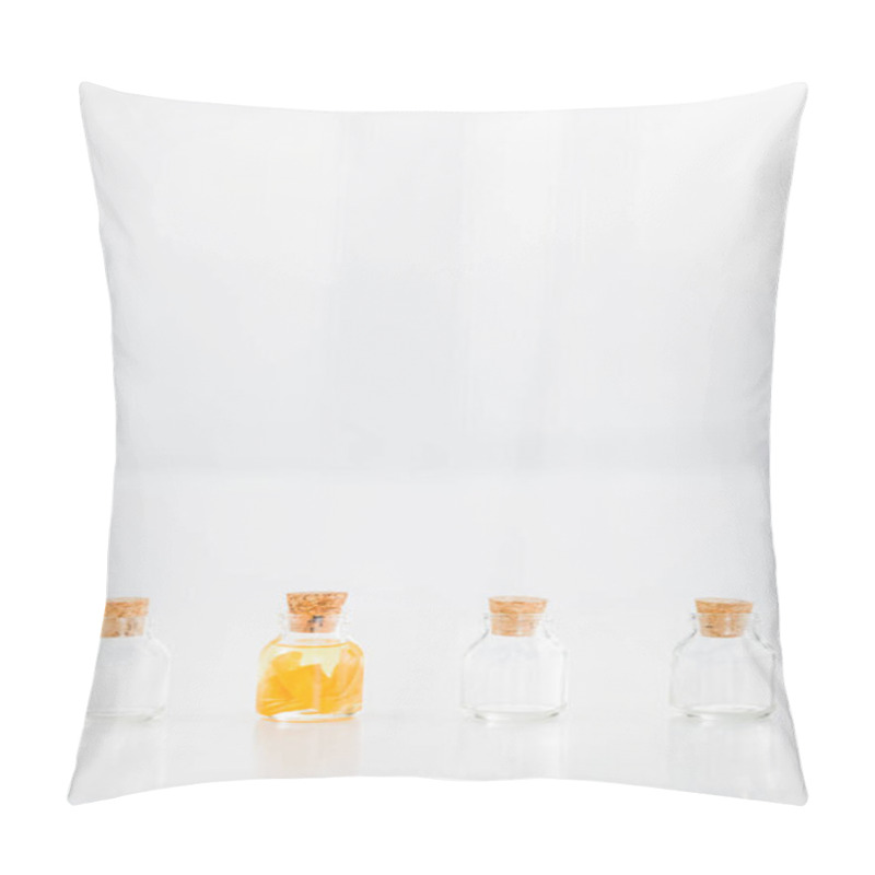 Personality  Glass Corked Bottle With Orange Essential Oil Near Empty Bottles On White Background With Copy Space Pillow Covers