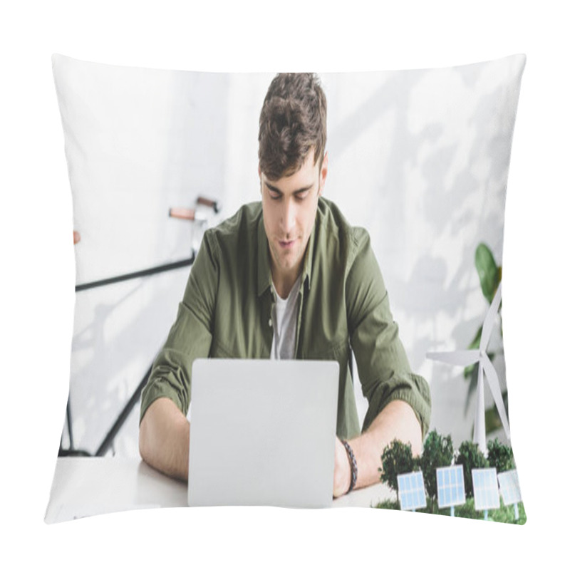 Personality  Handsome Architect In Green Shirt Sitting At Table With Laptop In Office Pillow Covers