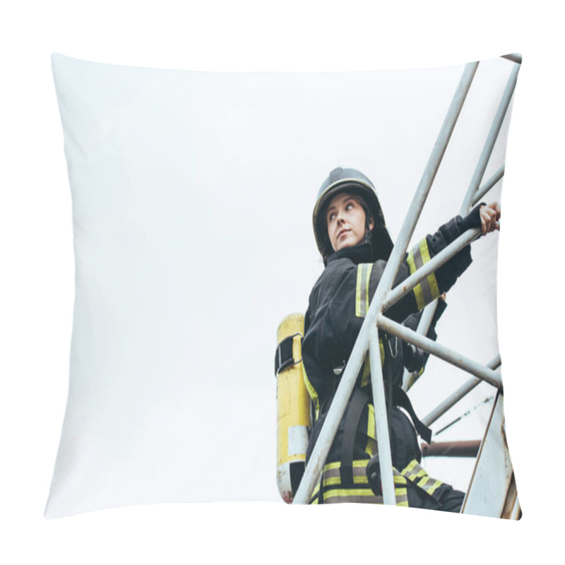 Personality  Female Firefighter In Protective Uniform And Helmet With Fire Extinguisher On Back Standing On Ladder With Blue Sky On Background Pillow Covers