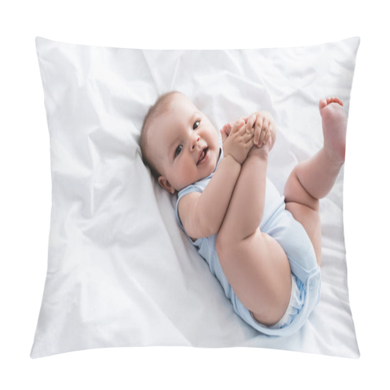 Personality  Overhead View Of Baby Boy Touching Legs While Lying On Bed Pillow Covers