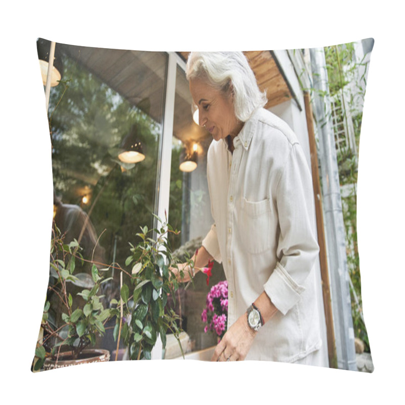 Personality  A Lovely Mature Woman Nurtures Her Vibrant Plants While Enjoying The Peaceful Outdoor Atmosphere. Pillow Covers