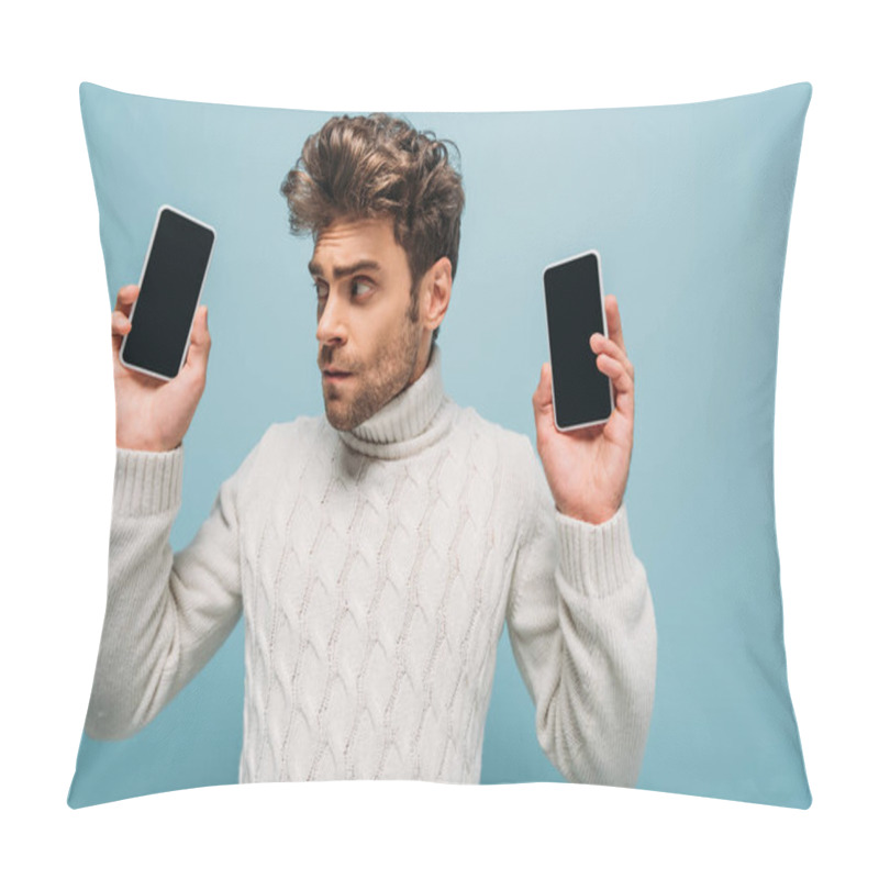 Personality  Emotional Man Looking At Two Smartphones With Blank Screens, Isolated On Blue Pillow Covers