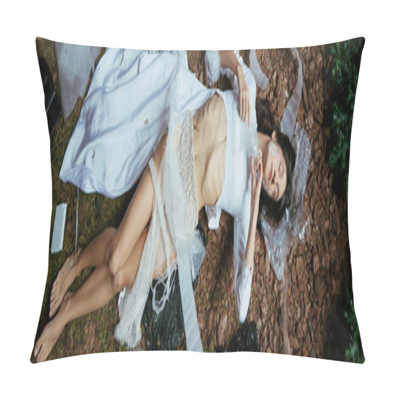 Personality  A Woman In A White Gown Lies In A Forest Setting Surrounded By Plastic Debris. Pillow Covers