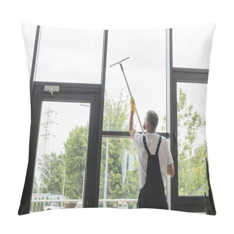 Personality  Back View Of Man In Overalls Washing Large Office Windows With Window Squeegee Pillow Covers