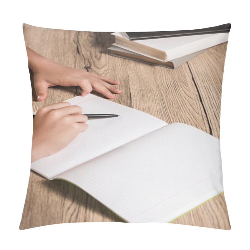 Personality  Cropped Image Of Schoolboy Doing Homework In Empty Textbook At Table With Stack Of Books  Pillow Covers