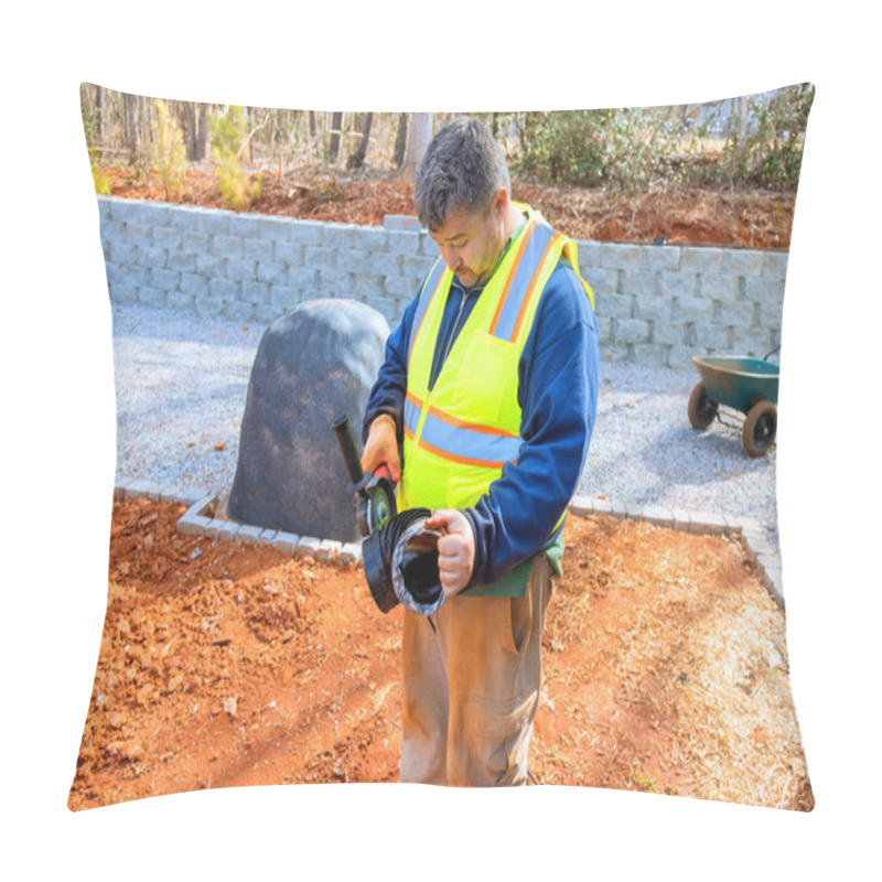 Personality  Worker Wearing Safety Vest Is Cuts Off Part Of Drainage Pipe Before Installation At During Construction Site Pillow Covers