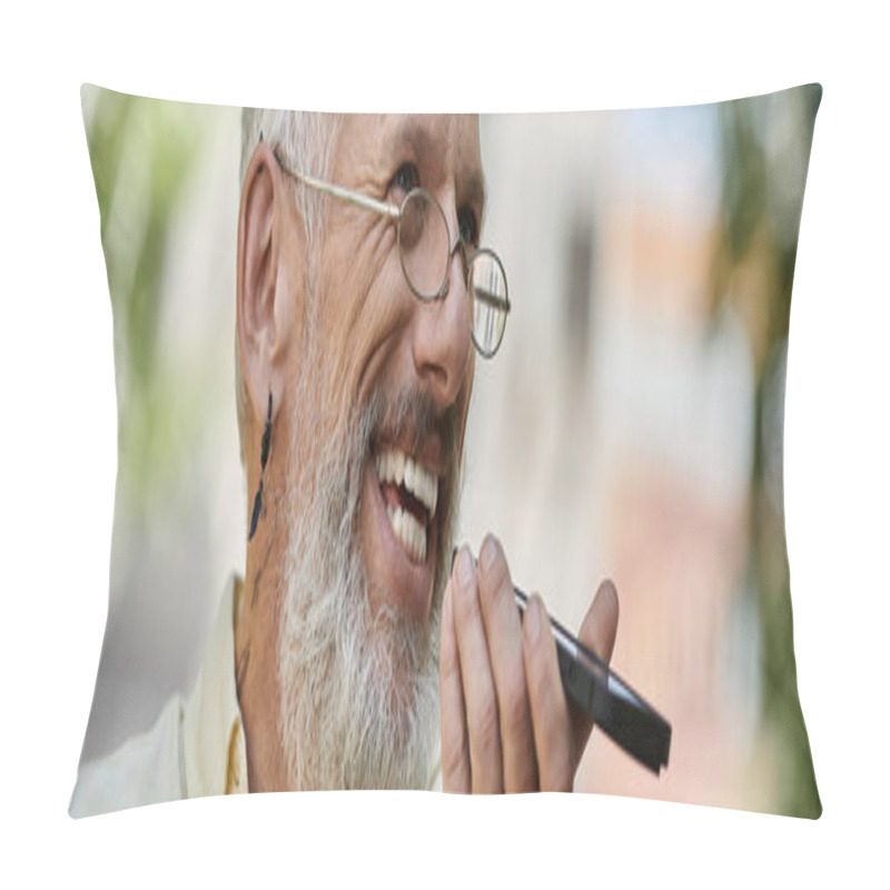 Personality  A Mature Man With A Beard And Glasses Smiles While Using His Phone Outside A Modern Building. Pillow Covers