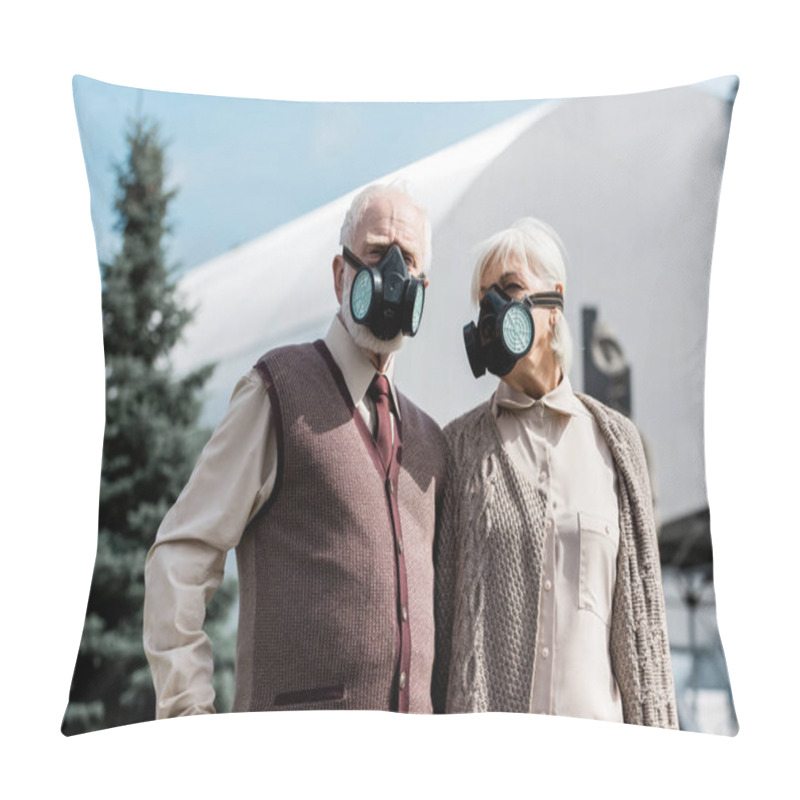 Personality  PRIPYAT, UKRAINE - AUGUST 15, 2019: Retired Couple In Protective Masks Standing Near Abandoned Chernobyl Reactor  Pillow Covers