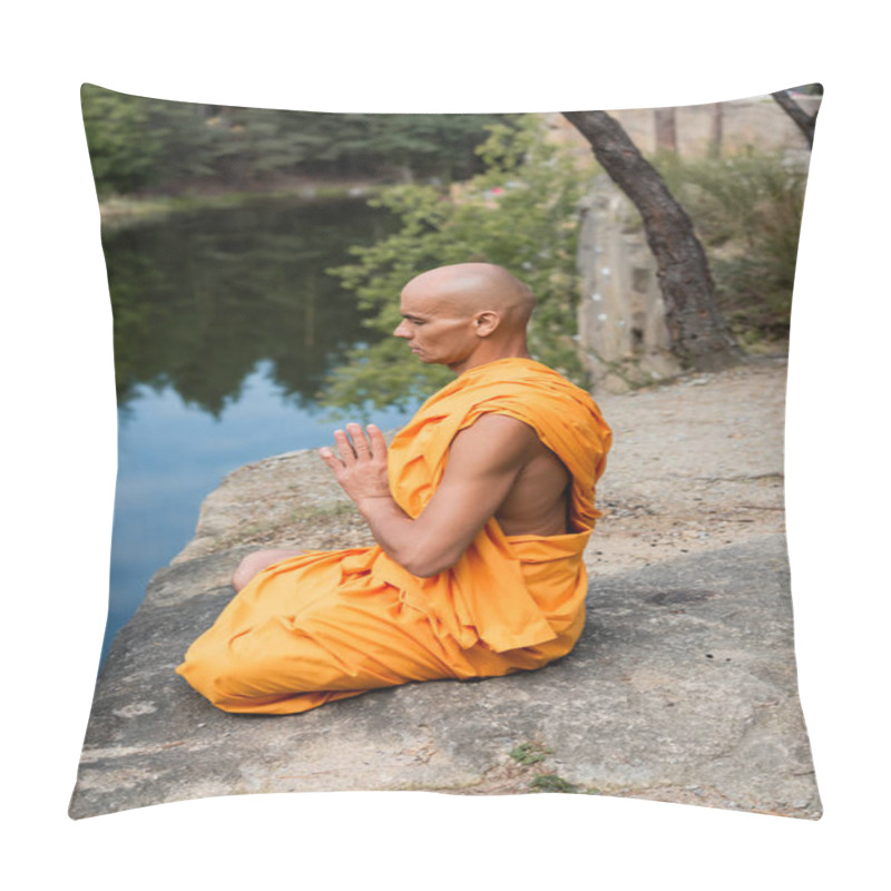 Personality  Buddhist In Orange Robe Meditating In Lotus Pose With Praying Hands On Rocky Cliff Near Water Pillow Covers