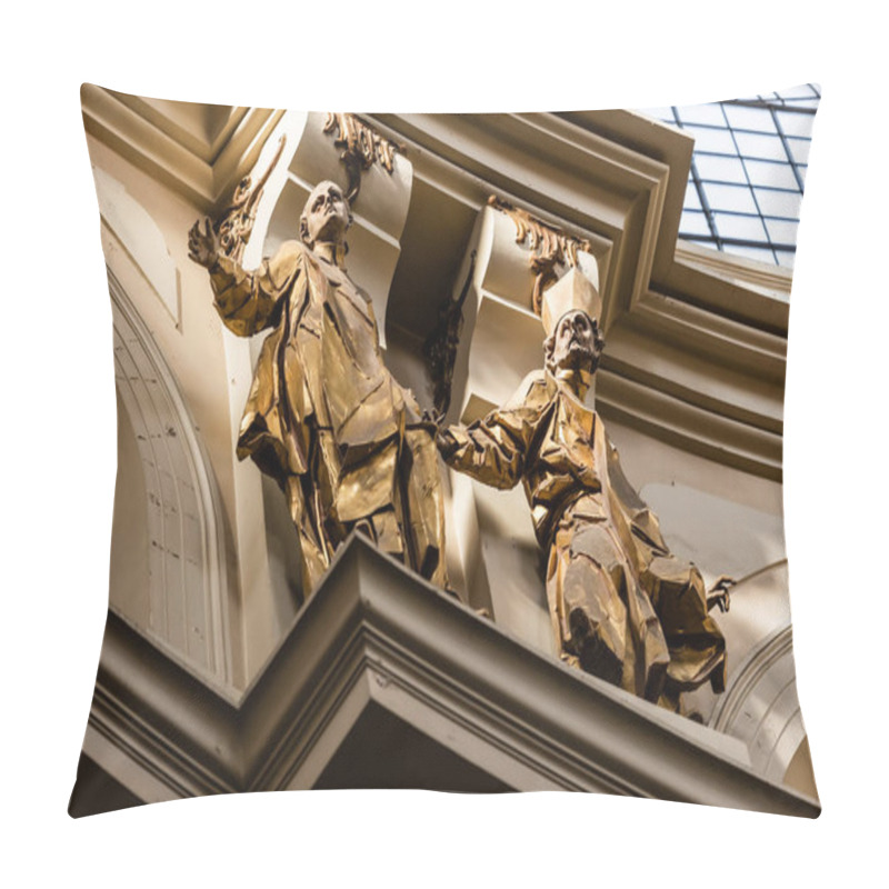 Personality  LVIV, UKRAINE - OCTOBER 23, 2019: Low Angle View Of Gilded Male Statues In Dominican Church Pillow Covers