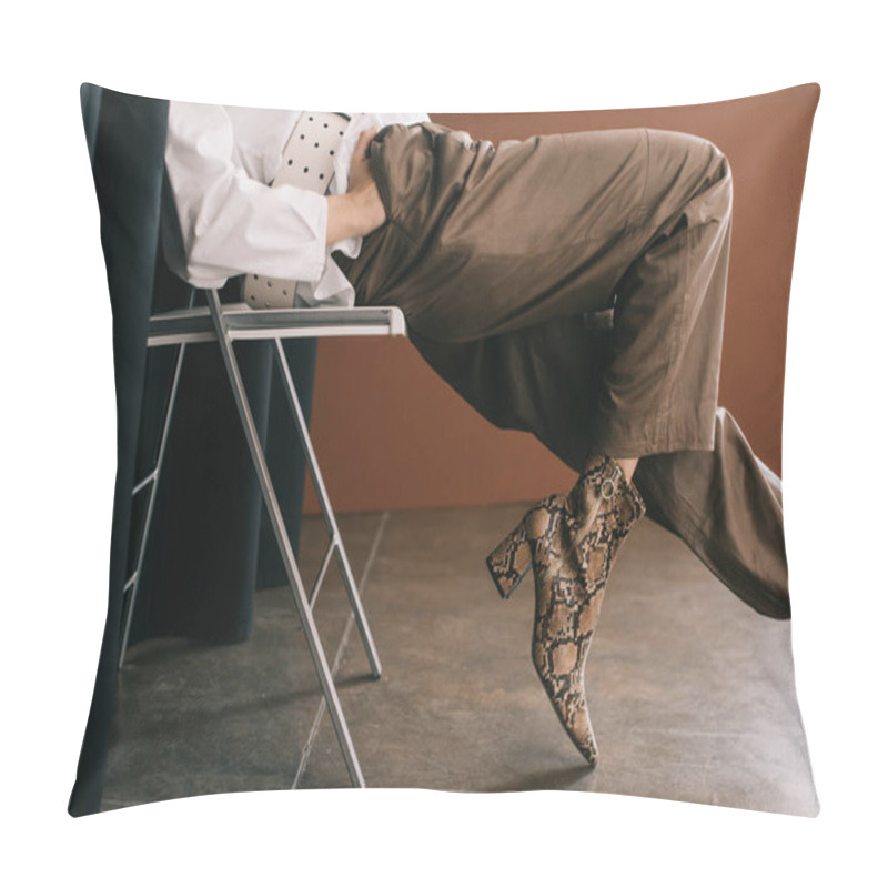 Personality  Croppped View Of Stylish Woman In White Blouse Sitting On Chair Near Curtain On Brown Pillow Covers