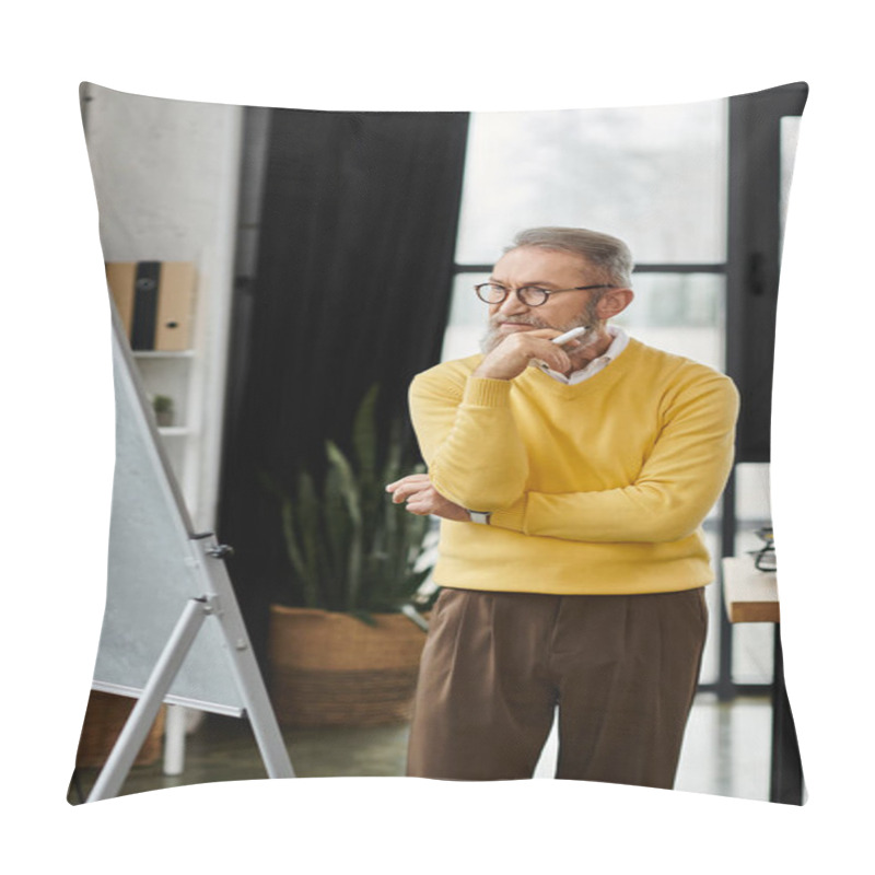 Personality  Mature Man In A Yellow Sweater Thinks Deeply While Observing A Whiteboard In A Modern Office. Pillow Covers